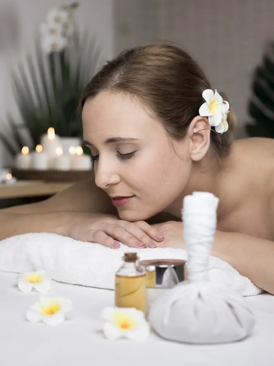 Guest relaxing during a Balinese spa treatment