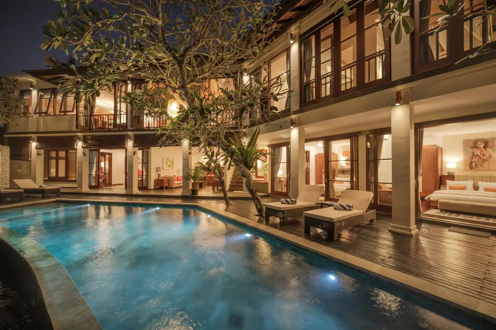 Villa Ambiente — Pool and villa at dusk