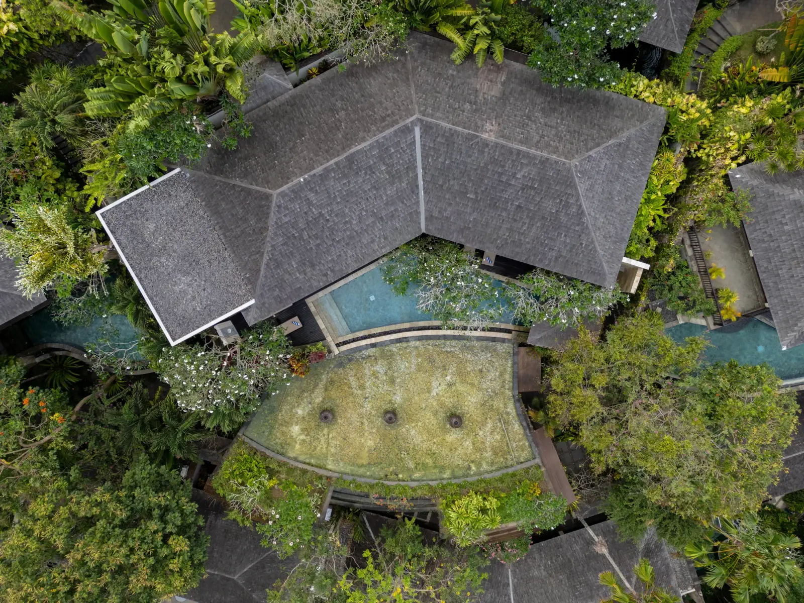 Villa Ambiente — Aerial view of the villa roof, pool and pond