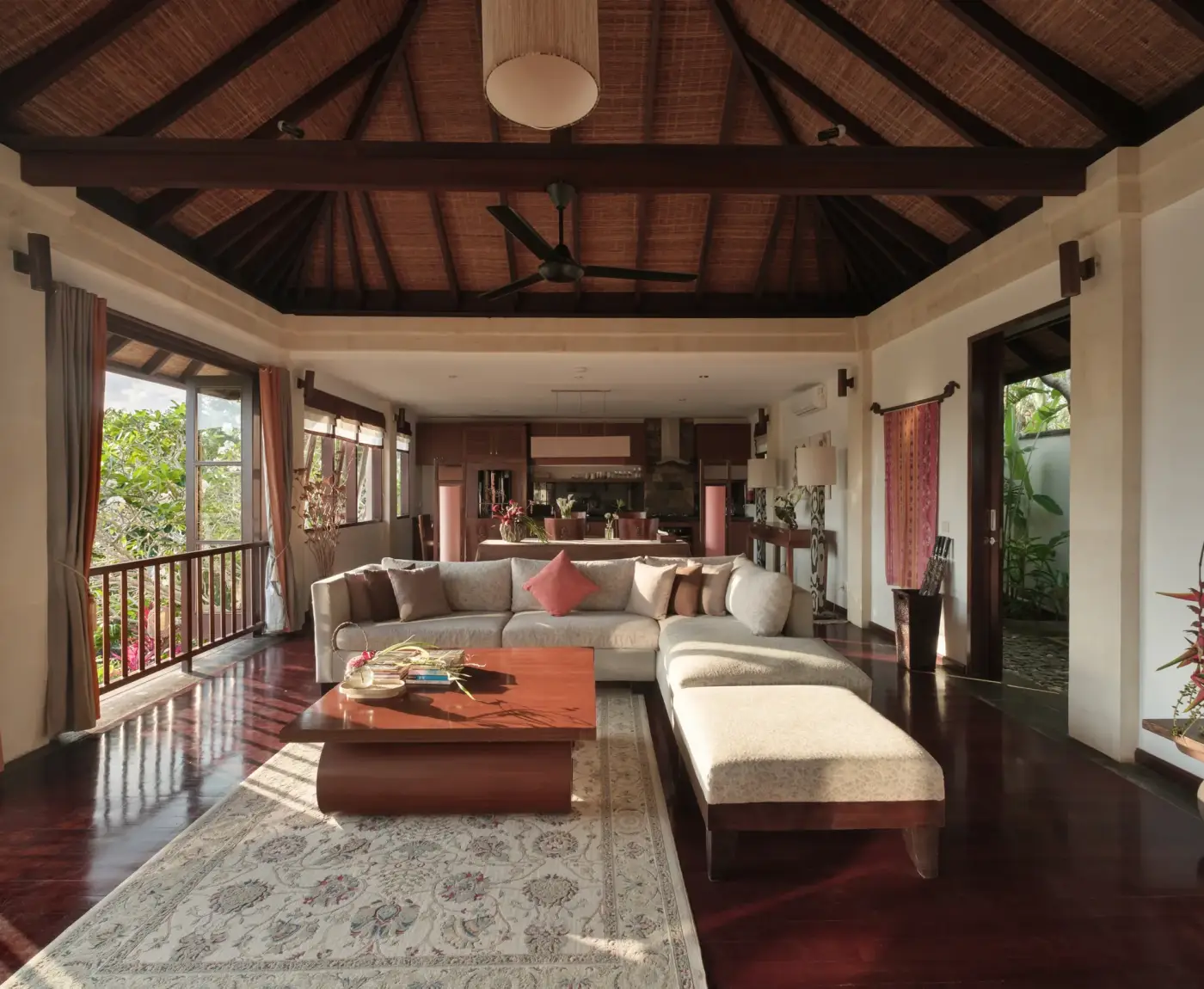 Villa Ambiente — Upstairs living room under a timber roof