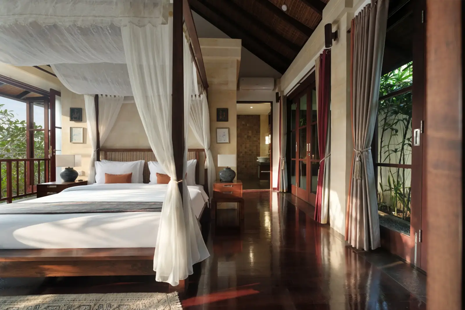 Villa Ambiente — Master bedroom under a timber roof