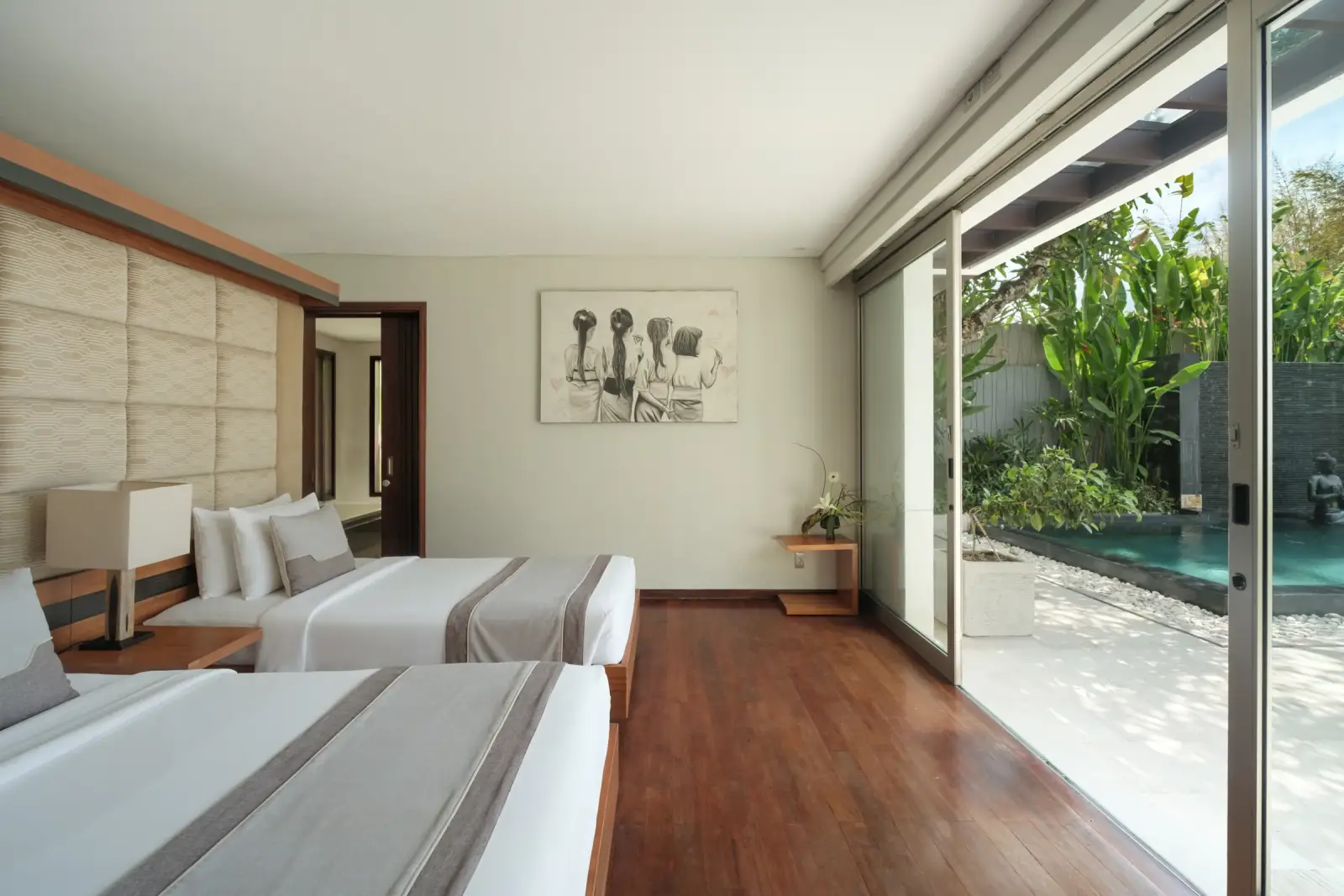 Villa Camellia — Twin bedroom opening onto the pool