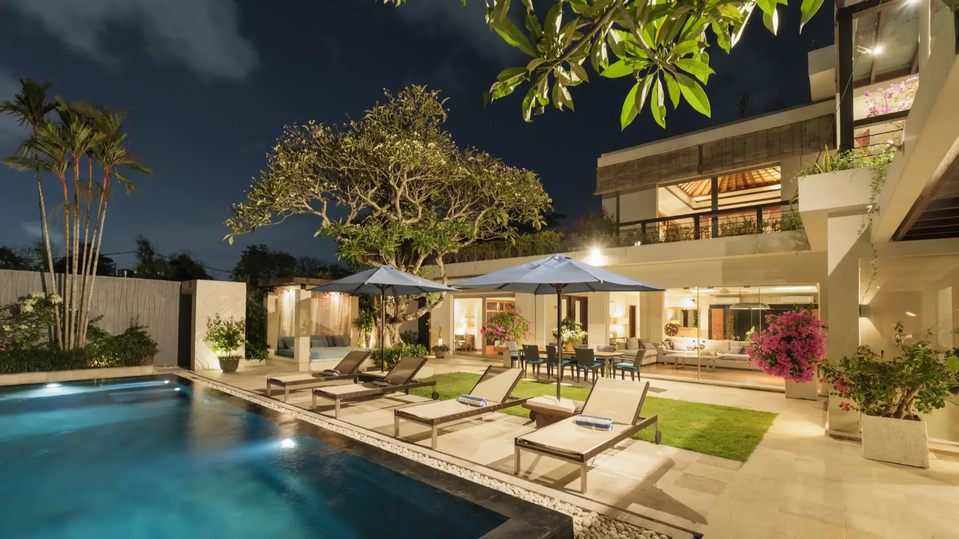 Villa Camellia pool and house lit up at night