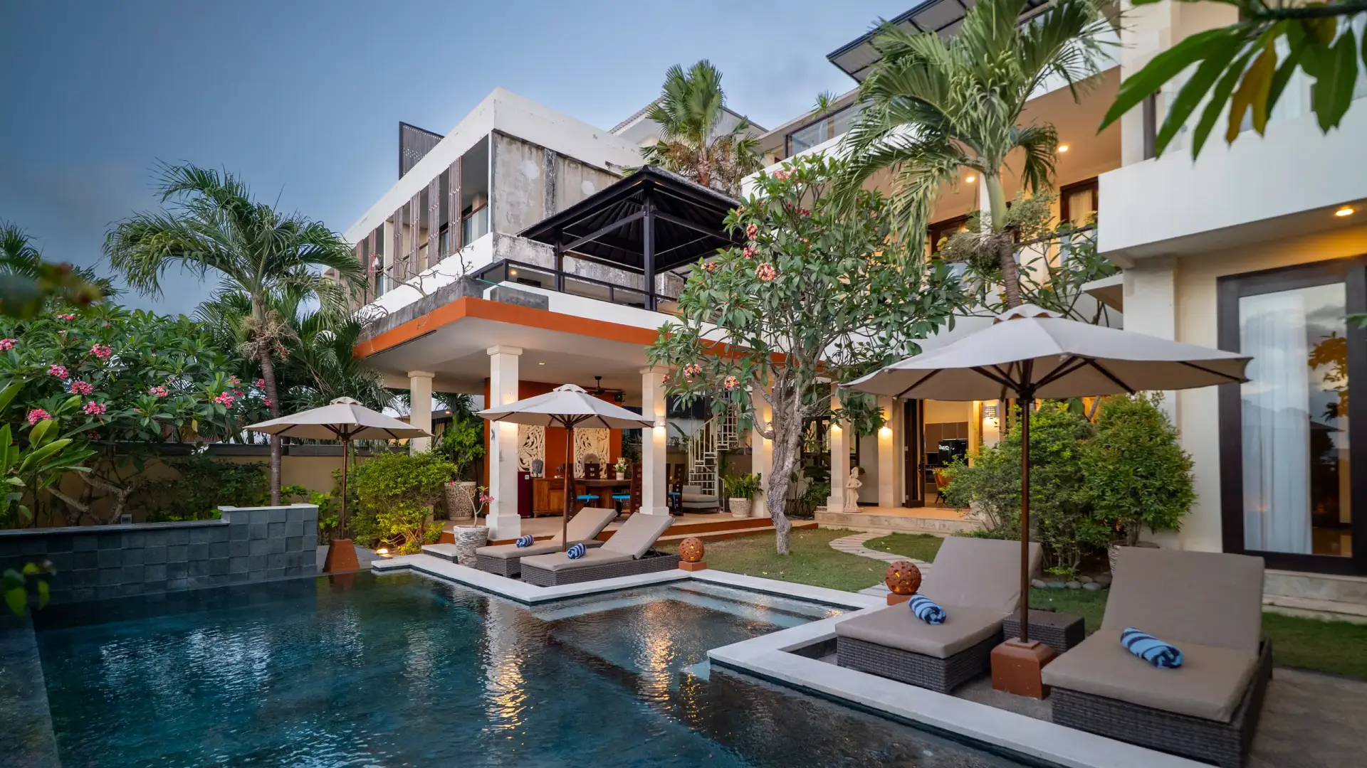 Villa Rayana pool and villa at dusk